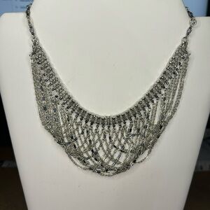 Stunning silver colored with beads chandeler necklace